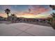 Landscaped backyard with patio and mountain views at 531 N Milan St, Henderson, NV 89015