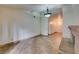 Living room with tile floors and hallway access at 6105 Heather Mist Ln, Las Vegas, NV 89108