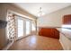 Kitchen dining area with tile floors and French doors leading outside at 6408 Fisher Ave, Las Vegas, NV 89130