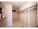 Large walk-in closet with ample shelving and hanging space at 6408 Fisher Ave, Las Vegas, NV 89130