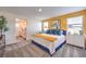 Spacious main bedroom with ensuite bathroom and stylish furnishings at 6570 Coffee Theme St # Lot 5, North Las Vegas, NV 89084