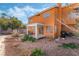 View of house from backyard, patio, and landscaping at , North Las Vegas, NV 89031