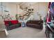 Spacious living room with two brown couches and a view of the staircase at , North Las Vegas, NV 89031