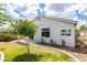 Home exterior and landscaped backyard view at 10976 Salernes St, Las Vegas, NV 89141