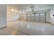 Spacious three-car garage with epoxy floor and automatic door openers at 10981 Laureldale Ct, Las Vegas, NV 89141