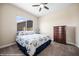 Spacious bedroom with a queen bed and ample closet space at 1143 Tortoise Mountain Dr, Mesquite, NV 89034