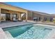 Relaxing backyard pool with patio and grill at 1143 Tortoise Mountain Dr, Mesquite, NV 89034