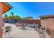 Backyard patio with table, chairs, and BBQ grill at 174 Sandhill Crane Ave, Henderson, NV 89002