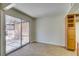 Bright dining area with patio access and wood-look floors at 200 Brookside Ln # C, Las Vegas, NV 89107