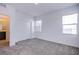 Bright bedroom with carpet and double door closet at 31 Newport Edge Pl, Henderson, NV 89015