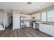 Modern kitchen with stainless steel appliances and white cabinetry at 3548 Lonesome Drum St, North Las Vegas, NV 89032