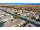 Aerial view of a community with houses and roads at 5123 Mascaro Dr, Las Vegas, NV 89122