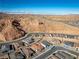 Aerial view of neighborhood development with desert landscape and homes at 647 Quarry Pass, Mesquite, NV 89034