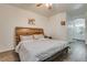 Bright bedroom featuring a king-size bed and en-suite bathroom access at 6480 Annie Oakley Dr # 314, Las Vegas, NV 89120