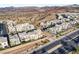 Wide aerial view of community and landscape at 699 Glowing Horizon St, Henderson, NV 89052