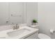 Clean bathroom with white vanity and updated fixtures at 699 Glowing Horizon St, Henderson, NV 89052