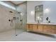 Modern bathroom with a walk-in shower and double vanity at 8649 Robinson Ridge Dr, Las Vegas, NV 89117