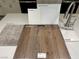 Kitchen and bathroom design materials including flooring and cabinetry at 9138 Vesey Ave, Las Vegas, NV 89148