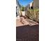 Small backyard with gravel and a small patio area at 92 Sea Holly Way, Henderson, NV 89074