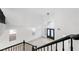 Open staircase leading to an upper level with high ceilings at 9795 La Cienega St, Las Vegas, NV 89183