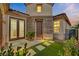 Elegant entryway with stone accents and landscaping at 1343 Panini Dr, Henderson, NV 89052