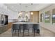 Bright kitchen with a large island and light wood cabinets at 1343 Panini Dr, Henderson, NV 89052