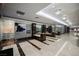 Modern hallway with marble floors and mirrored walls at 200 W Sahara Ave # 3607, Las Vegas, NV 89102