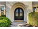 Ornate black front door with a welcoming mat at 2111 Bogart Ct, Las Vegas, NV 89117