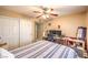 Spacious bedroom offering a comfortable bed and a dedicated workspace at 2750 S Durango # 1016, Las Vegas, NV 89117