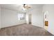 Main bedroom with ceiling fan and en-suite bathroom at 3549 Nantova Ct, Las Vegas, NV 89141