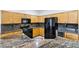 Spacious kitchen with granite countertops and black appliances at 3549 Nantova Ct, Las Vegas, NV 89141