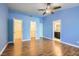 Main bedroom with wood floors and walk-in closets at 4812 Winterset Dr, Las Vegas, NV 89130