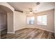 Bedroom with hardwood floors and large windows at 572 Decidedly St, Henderson, NV 89015