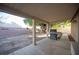 Covered patio with built-in grill and spacious backyard at 572 Decidedly St, Henderson, NV 89015