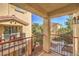 Private balcony with red railings and views of the community at 5950 Barbosa Dr # 8, North Las Vegas, NV 89031