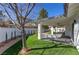 Covered patio with a swing and artificial turf at 8901 Dio Guardi Dr, Las Vegas, NV 89117