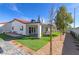 Artificial turf, patio, and a view of the house exterior at 8901 Dio Guardi Dr, Las Vegas, NV 89117