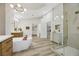 Bright bathroom with double sinks and a large shower at 9901 Laurel Springs Ave, Las Vegas, NV 89134