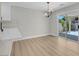 Minimalist dining area with sliding door access to patio at 1725 Rugged Ravine Ct, Las Vegas, NV 89183