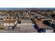 Aerial view of a house with a gravel driveway and yard at 1940 Walker St, Las Vegas, NV 89106