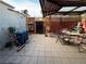 Covered patio with seating area and storage at 2425 Paradise Village Way, Las Vegas, NV 89120