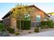 Side view of a single-story house with landscaping and neutral color scheme at 342 Torrelli Falls Ave, Henderson, NV 89011