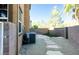 Small backyard with stone path and AC unit at 6255 W Arby Ave # 356, Las Vegas, NV 89118