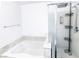 Bathroom features a bathtub and shower at 6255 W Arby Ave # 356, Las Vegas, NV 89118