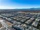 Aerial view of houses and landscape at 6952 Crescent Gold St, North Las Vegas, NV 89086