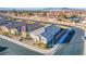 Single-story house aerial view, gray roof, brick driveway at 1028 Benton Ave, Henderson, NV 89015