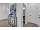 Bright entryway with modern console table and powder room at 10852 Avenzano St, Las Vegas, NV 89141