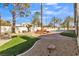 Landscaped backyard with pool, patio, and mature trees at 1870 Jasmine Joy Ct, Las Vegas, NV 89117