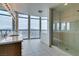 Spa-like bathroom with double sinks, large shower, and city views at 200 W Sahara Ave # 3008, Las Vegas, NV 89102