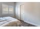 Comfortable bedroom with a closet and window with shutters at 2144 Paganini Ave, Henderson, NV 89052